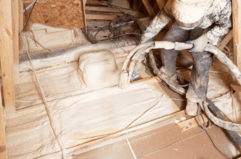 Spray Foam Insulation contractor applying polyurethane to a commercial building in Wisconsin