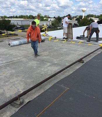Commercial flat roof installers at work in Wisconsin