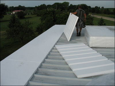 Re-roofing a metal flat roof with TPO outside Madison Wisconsin