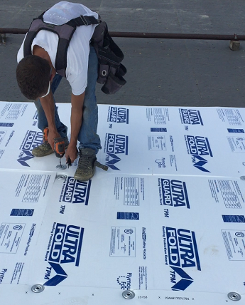 Our roofers have years of experience installing TPO roofing Installing a clean roofing surface prior to TPO membrane installation